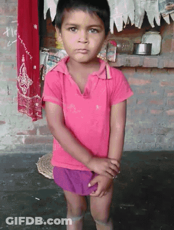 Little Girl In Pink Shirt And Shorts GIF