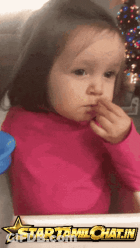 Little Girl In Pink Shirt Eating With Star Startamilchat.in GIF