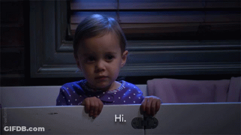 Little Girl In Purple Polka Dot Pajama Saying Hi GIF