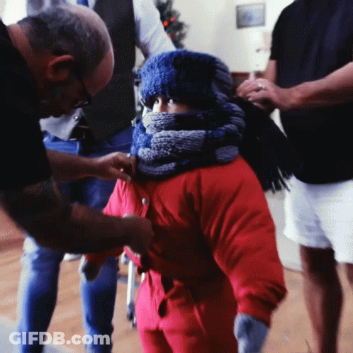 Little Girl In Red Jacket And Blue Scarf GIF