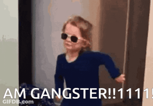 Little Girl In Sunglasses Saying Am Gangster GIF