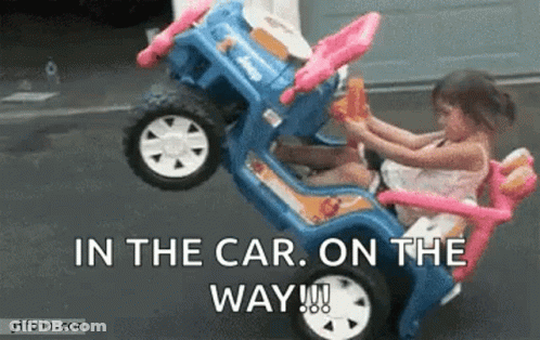 Little Girl In Toy Car On The Way GIF