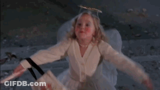 Little Girl In White Dress Says Bless You To Halloween Costumes GIF