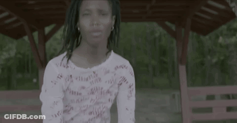 Little Girl In White Shirt Dancing In Front Of Gazebo GIF