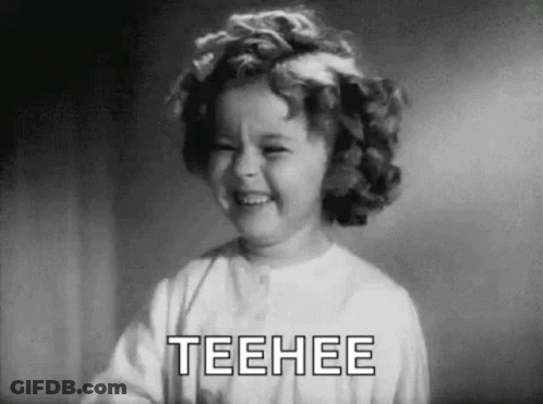 Little Girl Laughing In Black And White Saying Teehee GIF