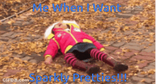 Little Girl Laying On Ground Me When I Want Sparkly Pretties GIF