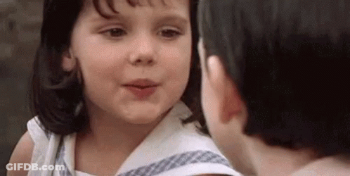 Little Girl Looking At Man's Face Close Up GIF