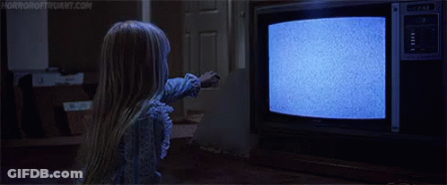 Little Girl Looking At TV With Ghost GIF