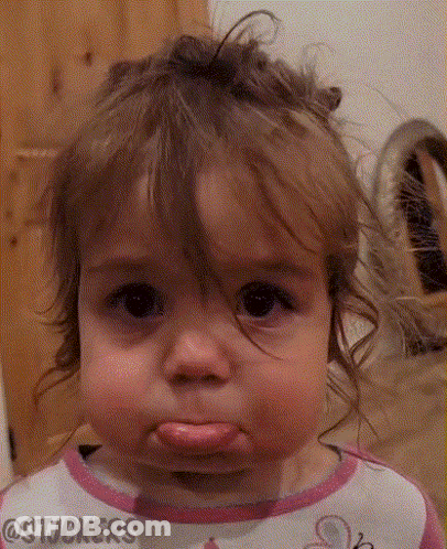 Little Girl Making Funny Face GIF