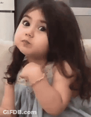 Little Girl Making Funny Face And Pointing GIF