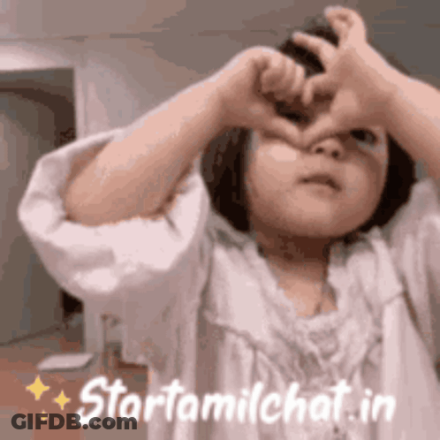 Little Girl Making Heart Shape With Hands GIF