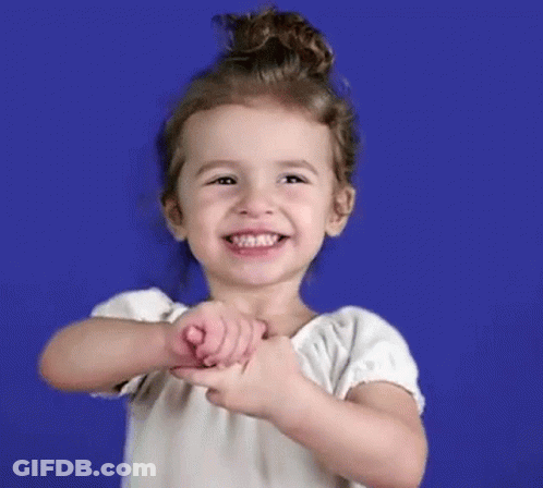 Little Girl Making Heart Shape With Hands GIF