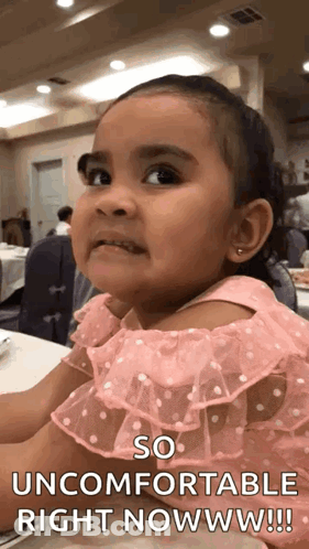 Little Girl Pink Dress Funny Face So Uncomfortable Right Now GIF