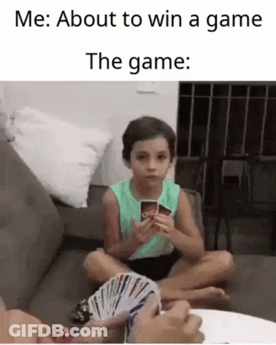 Little Girl Playing Uno On Couch GIF