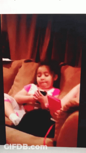Little Girl Playing With Red Tablet GIF