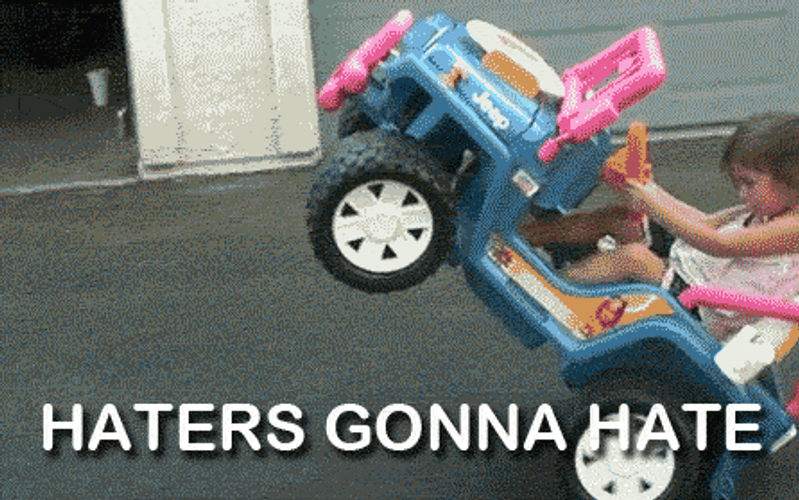 Little Girl Riding A Toy Car Haters GIF