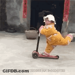 Little Girl Riding E-Scooter GIF