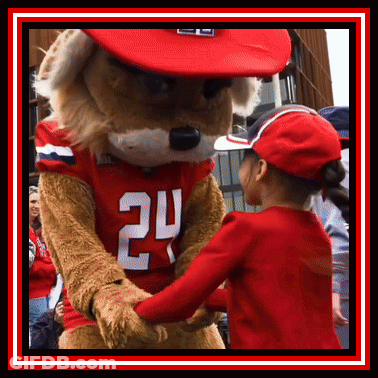 Little Girl Shakes Hands With Mascot Wearing Jersey 24 GIF