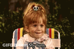 Little Girl Sitting In Beach Chair Saying My Turn GIF
