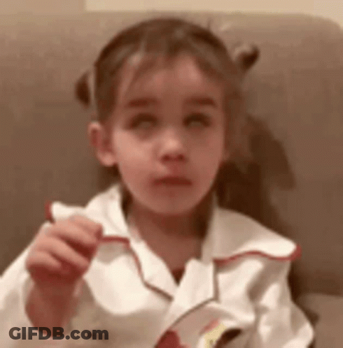 Little Girl Sitting In Chair Holding Paper GIF