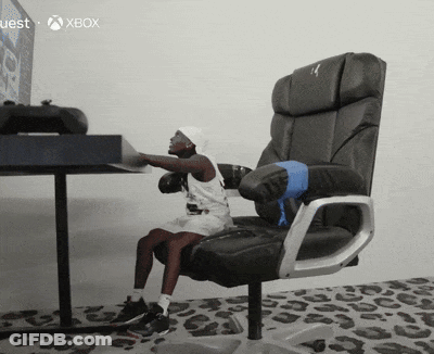 Little Girl Sitting In Chair In Front Of Xbox Monitor GIF
