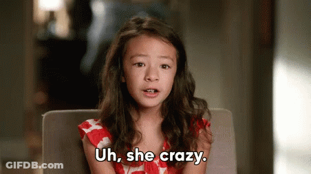 Little Girl Sitting In Chair Saying Uh She Crazy GIF