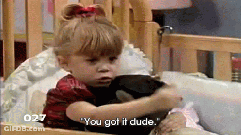 Little Girl Sitting In Crib Saying You Got It Dude GIF