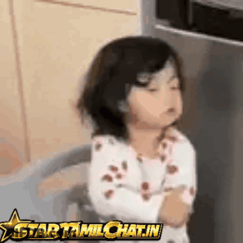 Little Girl Sitting In Front Of Star Tamilchat.in Sign GIF