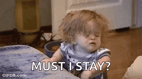 Little Girl Sitting On Couch Crying Says Must I Stay GIF