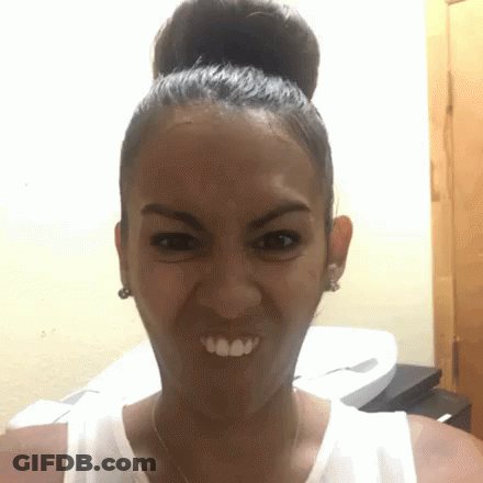Little Girl Sitting On Couch Eating With Eyes Closed GIF