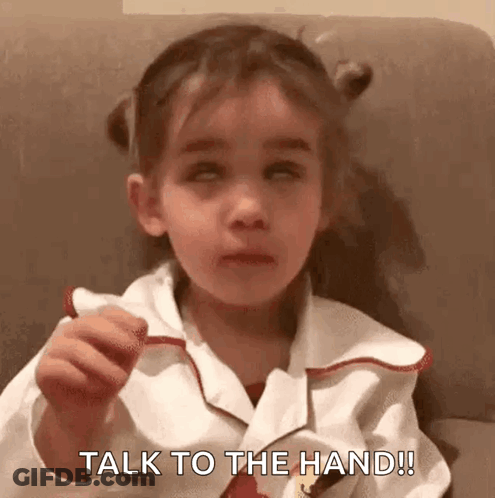 Little Girl Sitting On Couch Eyes Closed Talk To The Hand GIF