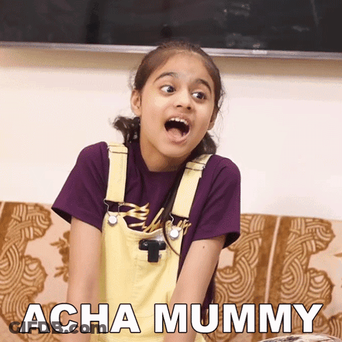 Little Girl Sitting On Couch Mouth Open Acha Mummy GIF