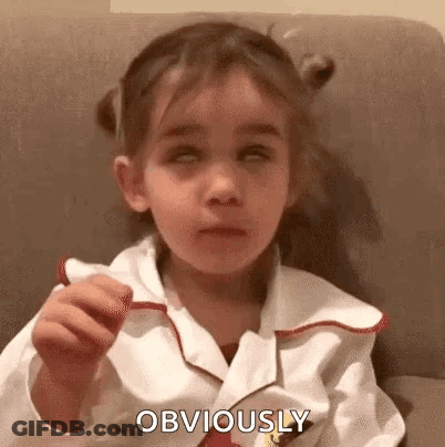 Little Girl Sitting On Couch With Eyes Closed GIF
