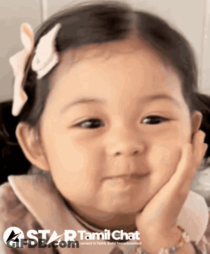 Little Girl Smiling Hand On Chin Star Tamil Chat Logo GIF