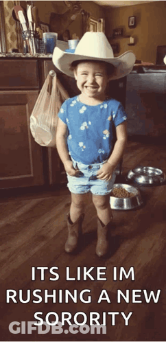 Little Girl Smiling In Cowboy Hat And Shorts GIF