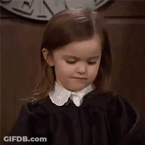 Little Girl Smirking Hmm GIF