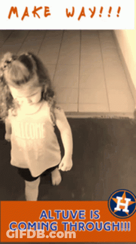 Little Girl Standing In Front Of Make Way Sign GIF