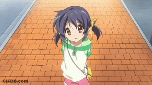 Little Girl Standing On Brick Sidewalk GIF