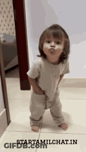 Little Girl Standing On Tiled Floor With Starttamilchat.in GIF