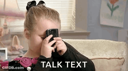 Little Girl Talking On Cell Phone Covering Face GIF