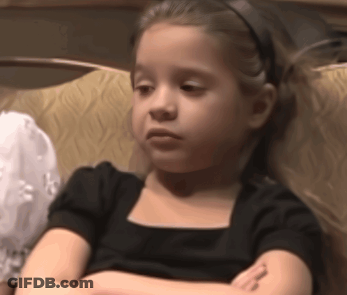 Little Girl With Arms Crossed In Black Dress GIF