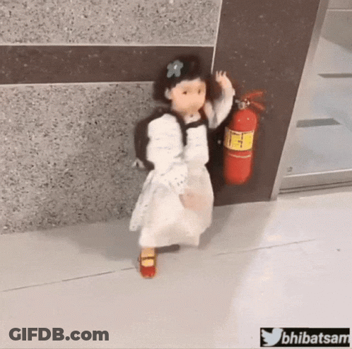 Little Girl With Backpack Holding Fire Extinguisher GIF