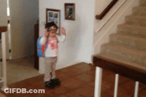 Little Girl With Backpack Near Stairs GIF
