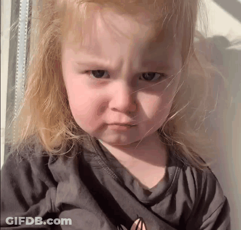 Little Girl With Blonde Hair Making Sad Face GIF