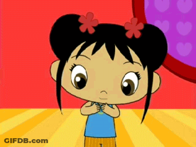 Little Girl With Flowers In Hair Against Red Wall GIF