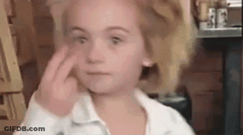 Little Girl With Glasses Sitting At Desk Netflix Logo GIF