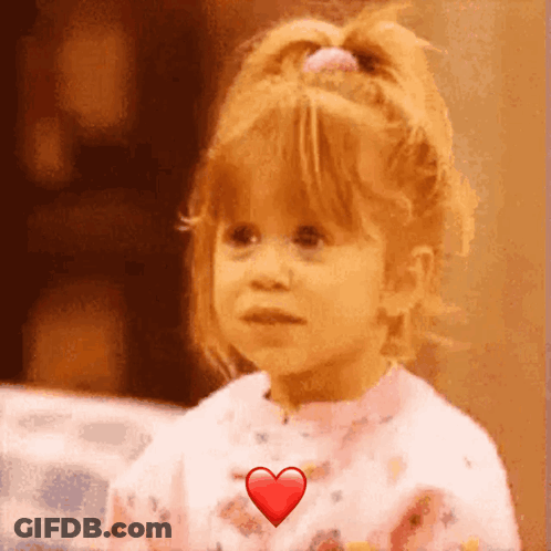 Little Girl With Heart In Chest GIF