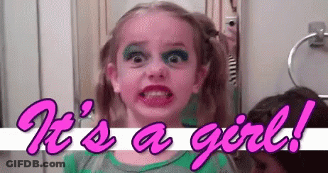 Little Girl With Makeup Making Funny Face In Mirror GIF