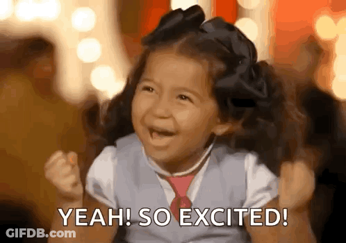 Little Girl With Pigtails And Tie Smiling Saying Yeah So Excited GIF