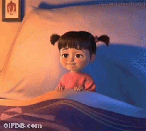 Little Girl With Pigtails Lying In Bed GIF